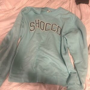 teal crewneck